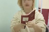 A young Crimean woman tore up her Russian passport at the border